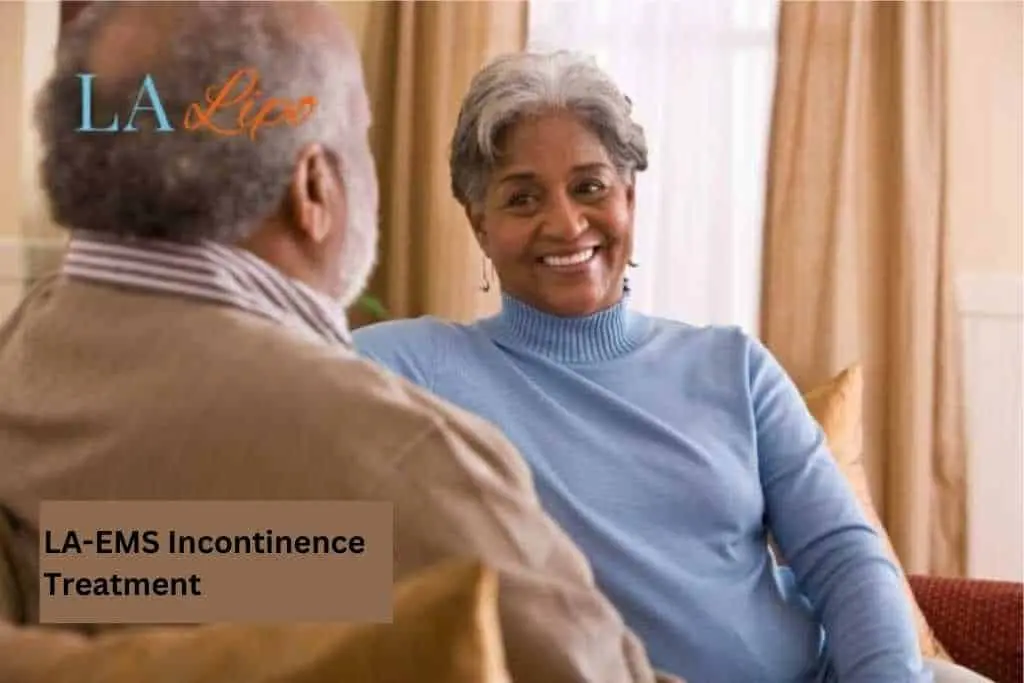 Couple sat smiling at each other - LA-EMS treatment Shoreham-by-Sea