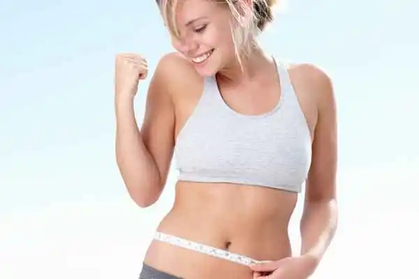 woman happy after fat reduction treatment Shoreham-by-Sea
