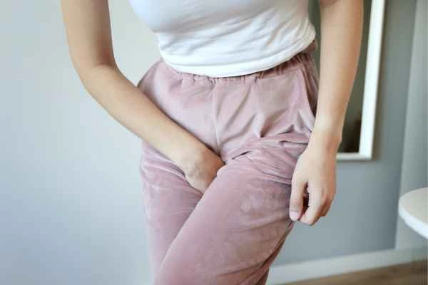 older woman running to the toilet because of urinary incontinence Shoreham-by-Sea